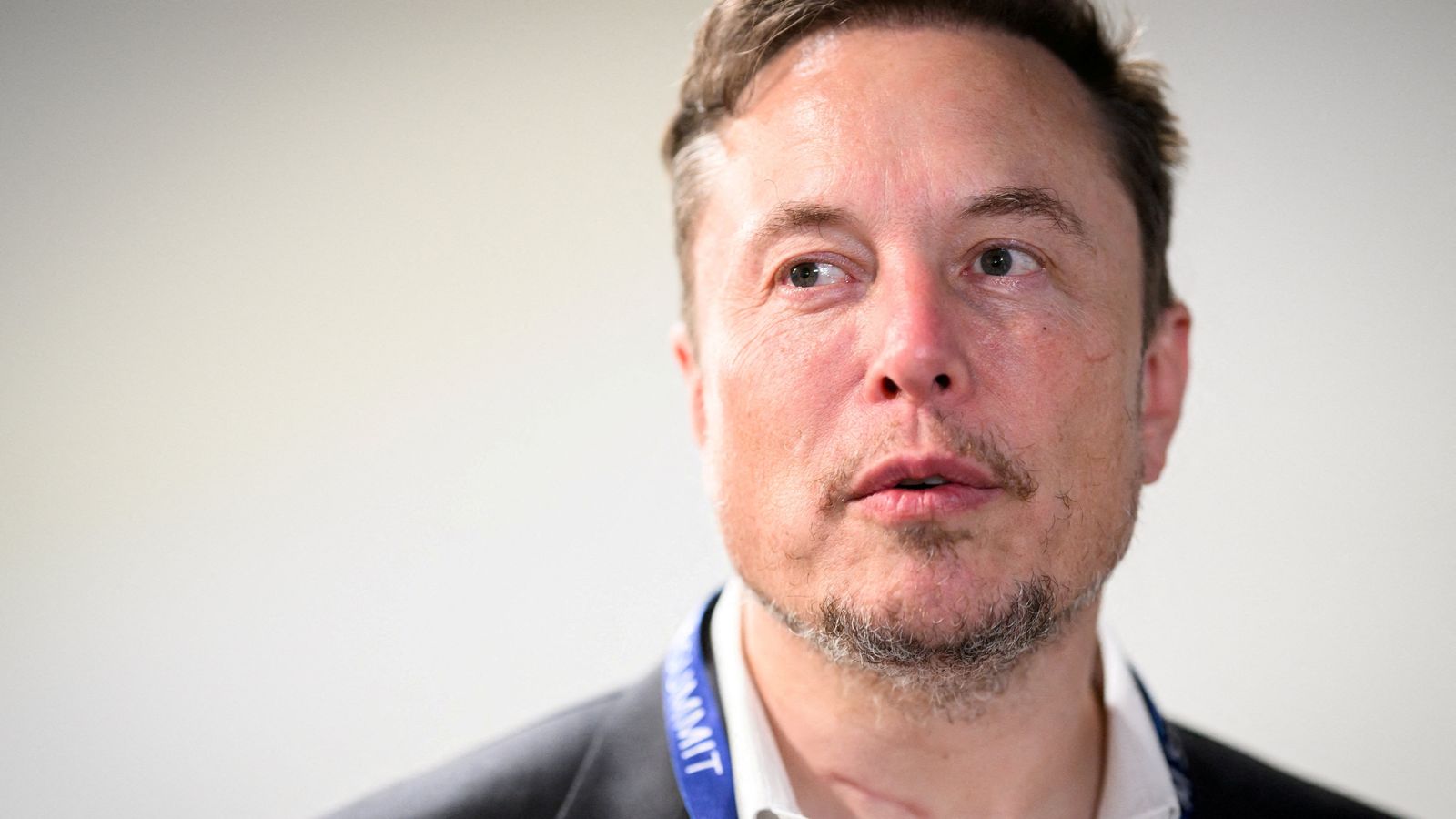 Musk apologises for antisemitic X post - but tells fleeing advertisers to 'go f*** yourself'