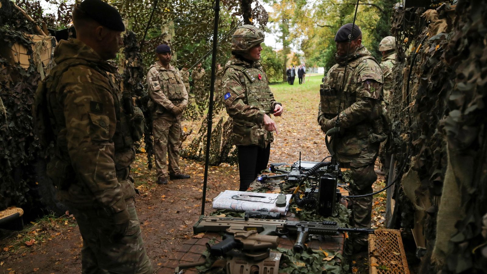 Camouflage Kate drives armoured vehicle with machine gun at Queen's ...