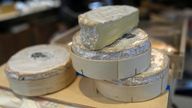 Camembert cheeses in their box. Pic: AP