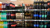 A shelf emptied of Coca-Cola drinks at a grocery shop in Zagreb, Croatia. Pic: AP Photo/Darko Bandic