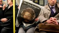 A woman reads a copy of the British Daily Telegraph newspaper with a photograph of the late former British Prime Minister Margaret Thatcher on the front page, on a Northern Line underground train in London, Tuesday, April 9, 2013. Queen Elizabeth II will be among the mourners at Thatcher&#39;s funeral on April 17, officials announced Tuesday. (AP Photo/Matt Dunham)