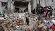 CORRECTS DATE Palestinians look at destruction after Israeli strikes on Rafah, Gaza Strip, Wednesday, Nov. 15, 2023. (AP Photo/Hatem Ali)