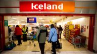 Elderly shoppers enter the branch of Iceland in the Kennedy Centre, Belfast, which has opened an hour early at 8am especially to allow elderly people the opportunity to shop freely