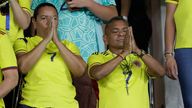 Luis Manuel Diaz, right, and Cilenis Marulanda watch their Son play for Brazil (Pic: AP)