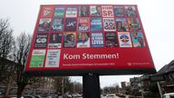 Billboard displaying posters of many of the parties contesting the Netherlands general election  