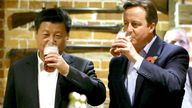 Britain&#39;s Prime Minister David Cameron (R) drinks beer with Chinese President Xi Jinping at a pub in Princes Risborough, near Chequers, England, October 22, 2015.  REUTERS/Kirsty Wigglesworth/Pool      TPX IMAGES OF THE DAY