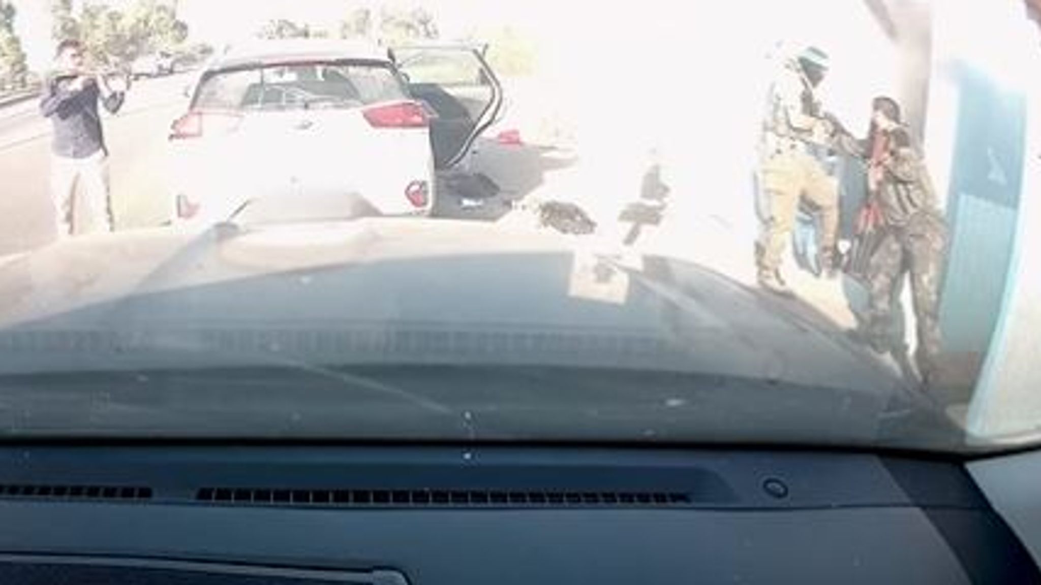 Dashcam video shows Hamas gunmen toss grenade into bomb shelter