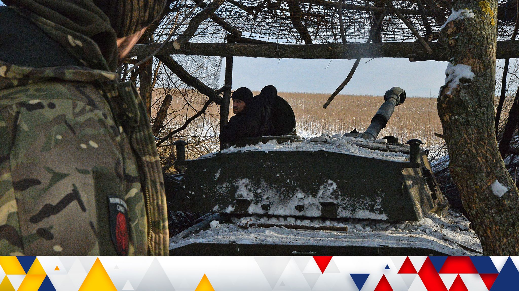 Ukrainian soldiers burn Russian flag in Vovchansk as they regain territory  