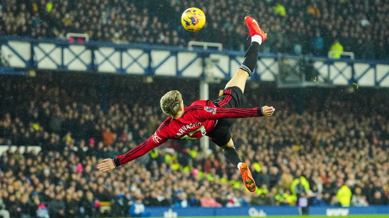 Manchester United&#39;s Alejandro Garnacho scores his side&#39;s first goal during the English Premier League soccer match between Everton and Manchester United, at Goodison Park Stadium