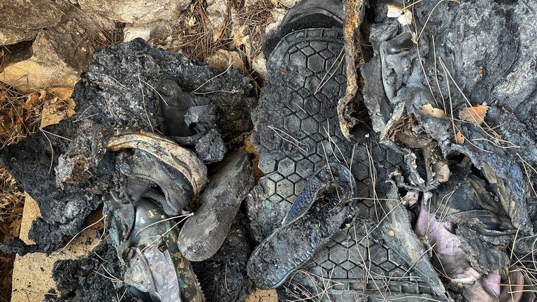 Black charred children&#39;s shoes