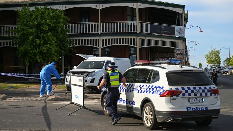 Victorian police work the scene of a deadly car crash outside the Royal Hotel in Daylesford, Australia, Monday, Nov. 6, 2023. A car crashed into an Australian pub...s outdoor dining area, killing and injuring multiple people, officials said on Monday. (James Ross/AAP Image via AP)