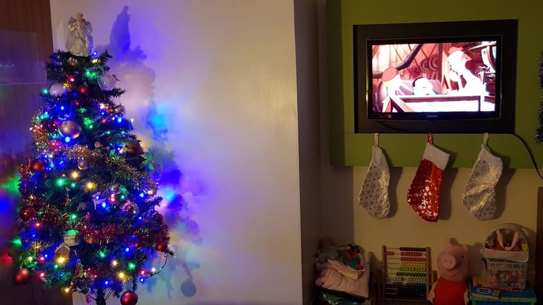 Josie Mears has just put up a Christmas tree in her hotel room that she shares with her children