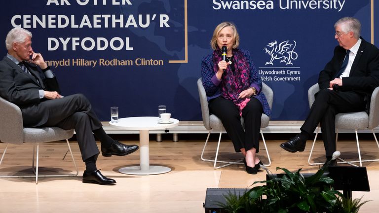 Bill and Hillary Clinton, and Mark Drakeford. Pic: Swansea university