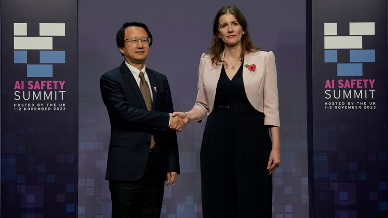  Michelle Donelan, Secretary of State for Science, Innovation and Technology, right, and Wu Zhaohui, Chinese Vice Minister of Science and Technology, shake hands prior to the AI Saftey Summit in Bletchley Park
Pic:AP
