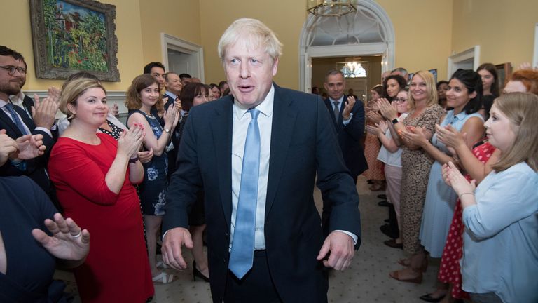 New Prime Minister Boris Johnson is clapped into 10 Downing Street by staff after seeing Queen Elizabeth II and accepting her invitation to become Prime Minister and form a new government.
