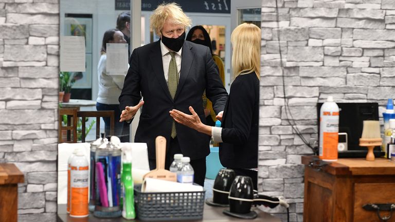 Prime Minister Boris Johnson in Lemonheads Barber shop during a visit to Lemon Street Market in Truro, Cornwall to see how they are preparing to reopen ahead of Step 2 of the roadmap on Monday 12 April. Picture date: Wednesday April 7, 2021.
