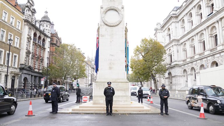Metropolitan Police officers on duty on Friday beside the Cenotaph on Whitehall