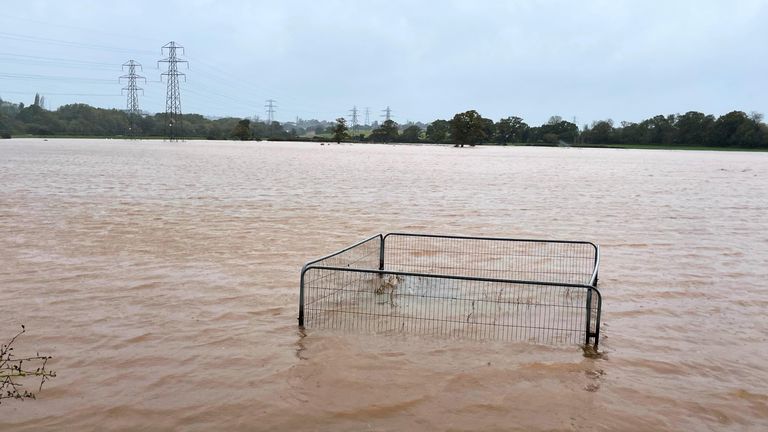 Flood water covers a field after the River Clyde overflowed in Clyst Saint Mary, near Exeter, as Storm Ciaran brings high winds and heavy rain along the south coast of England.  