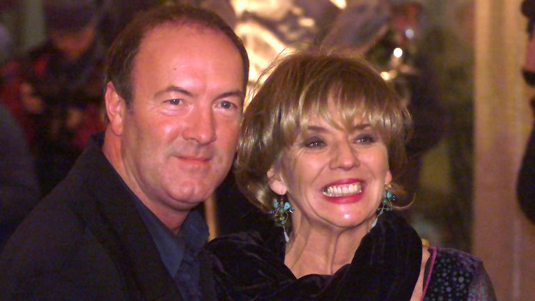 Actress Sue Johnston, who stars in BBC tv&#39;s The Royle Family, accompanied by actor Dean Sullivan, who plays Jimmy Corkhill in Brookside, arriving at the British Comedy Awards 2000 presentation, in London.