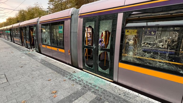 Smashed windows on the Luas on O’Connell Street, Dublin, Ireland.