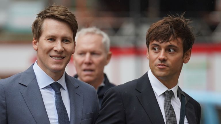Dustin Lance Black (L) arrives at Westminster Magistrates&#39; Court with his husband Tom Daley