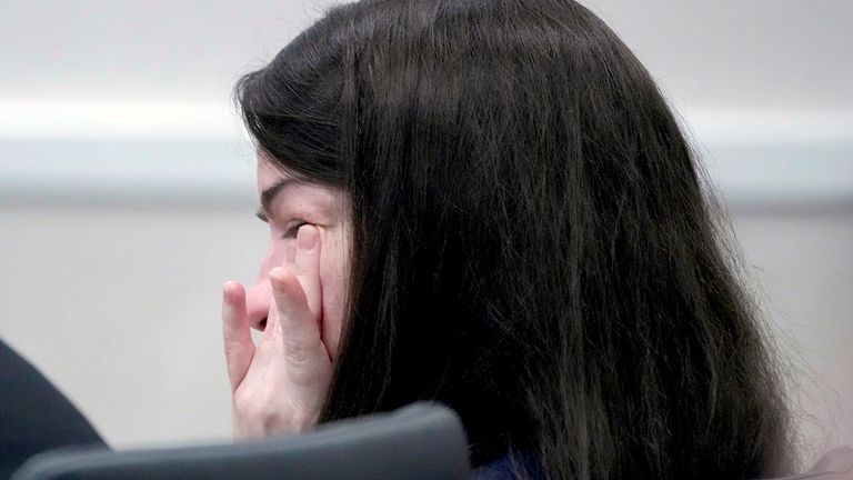 Jessy Kurczewski wipes away tears as Deputy District Attorney Abbey Nickolie gives closing arguments during her trial at the Waukesha County Courthouse in Waukehsa, Wis., Monday, Nov. 13, 2023. Kurczewski is charged in the 2018 death of Lynn Hernan, 61, of Pewaukee, after an autopsy showed Hernan died from ingesting tetrahydrozoline, the main ingredient in eyedrops. (Mike De Sisti/Milwaukee Journal-Sentinel via AP, Pool)