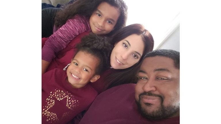 Robert Williams, 45, from Detroit, pictured here with his family, was questioned by police after AI-based facial recognition technology wrongly identified him as a suspect in an investigation