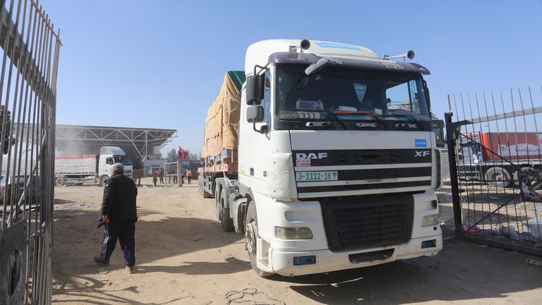 Trucks carrying humanitarian aid enter Gaza Strip from Egypt in Rafah as a temporary ceasefire went into effect Friday, Nov. 24, 2023. (AP Photo/Hatem Ali)