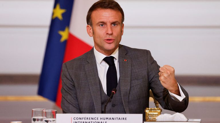Emmanuel Macron gestures as he speaks during an international humanitarian conference for civilians in Gaza