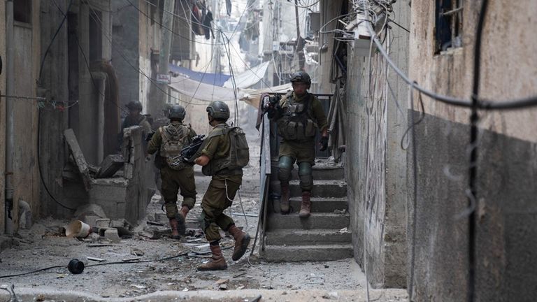Israeli troops operate in a location given as central Gaza City, Gaza Strip. Pic: IDF