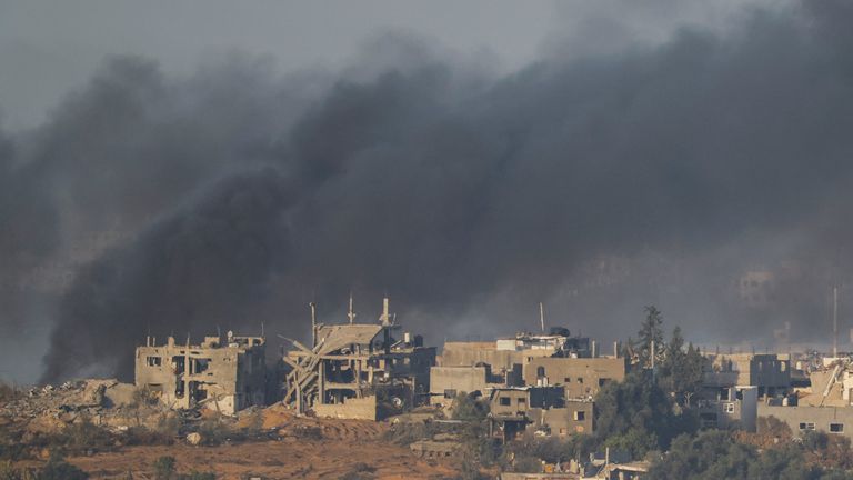 Smoke rises in Gaza, due to Israeli airstrikes before the start of a temporary truce between Hamas and Israel, as seen from southern Israel November 24, 2023. REUTERS/Alexander Ermochenko