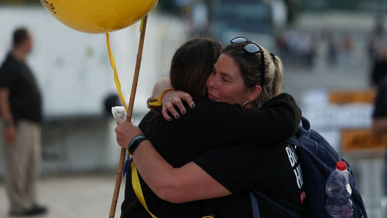 Marchers hugging in Jerusalem