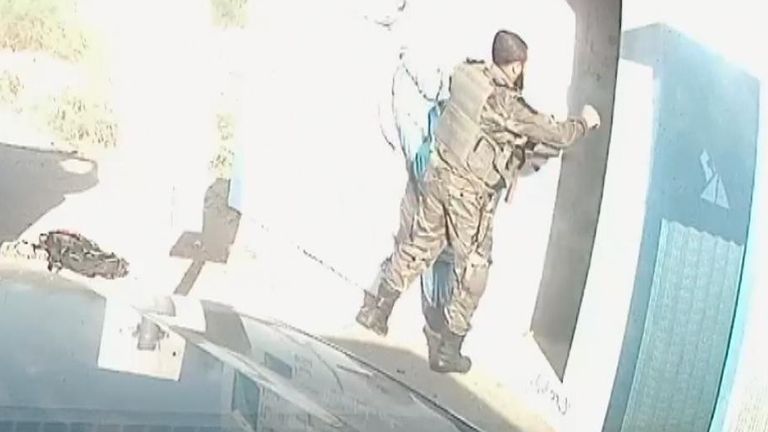 Dashcam video shows Hamas gunmen toss grenade into bomb shelter
