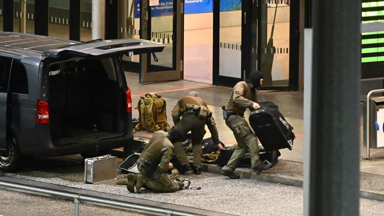 Armed police officers with special equipment deployed at the airport. Pic: AP