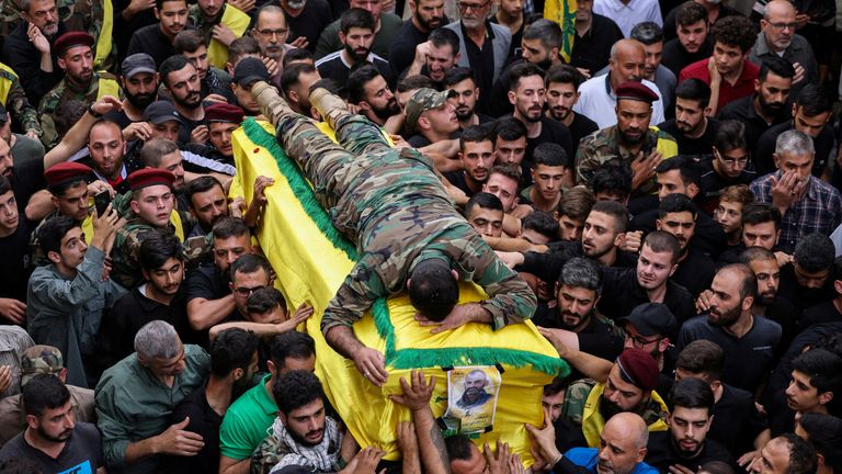 A son of a Hezbollah leader killed in fighting with Israel lies on his father&#39;s coffin