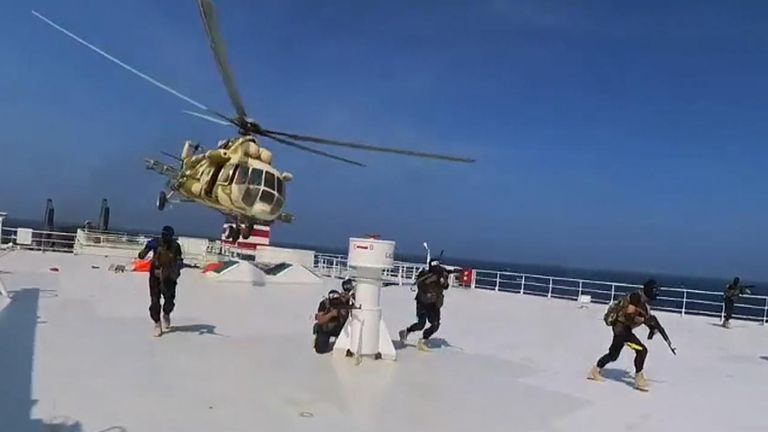 Yemen&#39;s Houthis released a video showing armed men seizing a cargo ship in the southern Red Sea. Pic: Yemeni Military Media