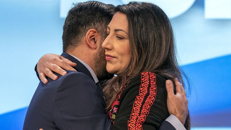 First Minister and SNP leader Humza Yousaf embraces his wife councillor Nadia El-Nakla after she spoke on an emergency motion on Israel-Palestine during the SNP annual conference at The Event Complex Aberdeen (TECA) in Aberdeen. Picture date: Sunday October 15, 2023.