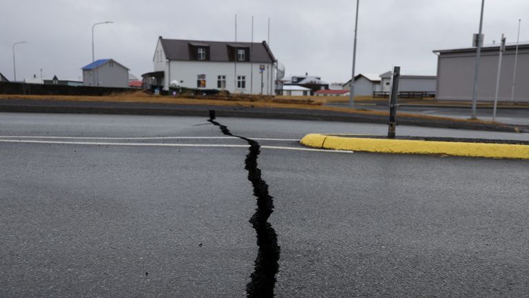 Cracks emerge on a road due to volcanic activity near a police station, in Grindavik, Iceland November 11, 2023. RUV/Ragnar Visage/Handout via REUTERS THIS IMAGE HAS BEEN SUPPLIED BY A THIRD PARTY. NO RESALES. NO ARCHIVES. MANDATORY CREDIT
