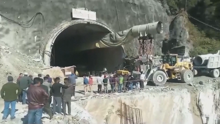 The under-construction road tunnel collapsed on Sunday following a landslide in India&#39;s northern Himalayan state of Uttarakhand - a region popular with tourists.