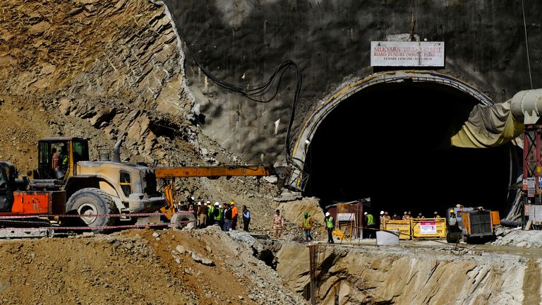 Heavy machinery moves outside a tunnel where 40 road workers are trapped after a portion of the tunnel collapsed in Uttarkashi in the northern state of Uttarakhand, India, November 16, 2023. REUTERS/Shankar Prasad Nautiyal NO RESALES. NO ARCHIVES.