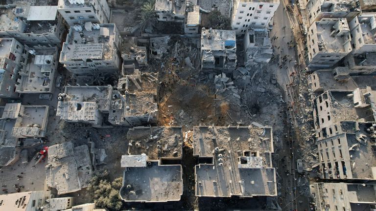 Palestinians gather at the site of Israeli strikes on houses in Maghazi, in the central Gaza Strip, November 3, 2023. REUTERS/Mohammed Fayq Abu Mostafa TPX IMAGES OF THE DAY
