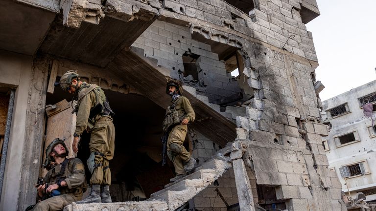 Israeli soldiers operate amid the ongoing ground invasion against Hamas
