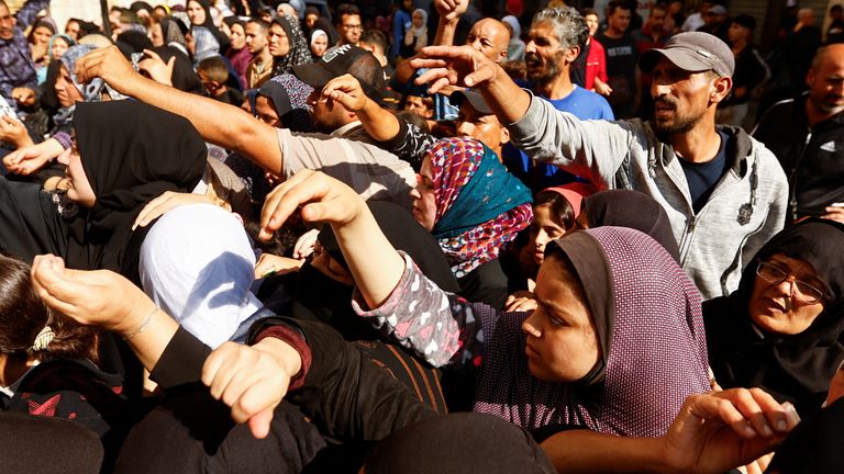 Palestinians waiting for bread in Khan Younis, where leaflets have been dropped telling residents to leave