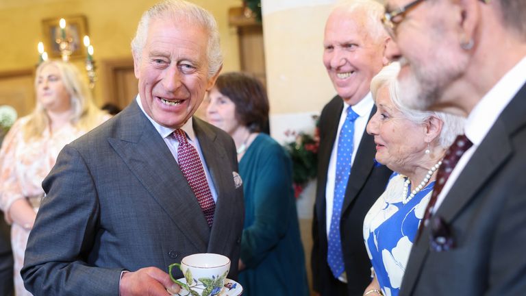 King Charles III meeting guests during his 75th birthday party at Highgrove Gardens in Tetbury on the eve of his birthday, with community champions who are also celebrating turning 75 in 2023. Picture date: Monday November 13, 2023.