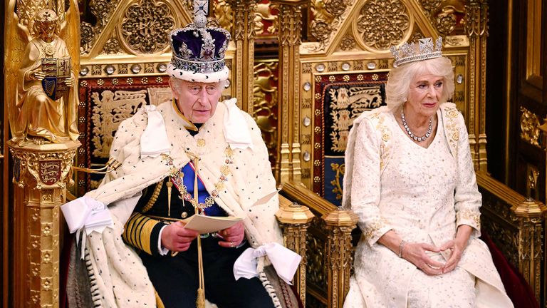 King Charles III delivers a speech beside Queen Camilla during the State Opening of Parliament in the House of Lords Chamber, in London, Britain, November 7, 2023. Leon Neal/Pool via REUTERS