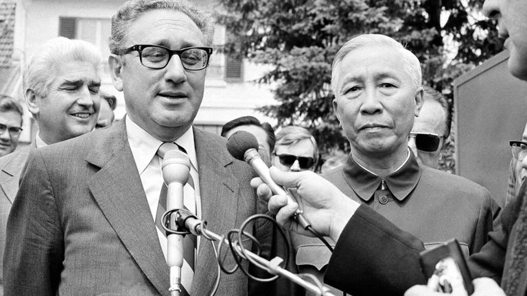FILE - In this Wednesday June 13, 1973 file photo, President Nixon&#39;s National Security Adviser Henry A. Kissinger, left, and Le Duc Tho, member of Hanoi&#39;s Politburo, are shown outside a suburban house at Gif Sur Yvette in Paris after negotiation session. Founder of the Nobel Prize Alfred Nobel gave only vague instructions on how to select winners, leaving wide room for interpretation by the prize committees in Stockholm and Oslo. In 1973 U.S. Secretary of State Henry Kissinger and North Vietname