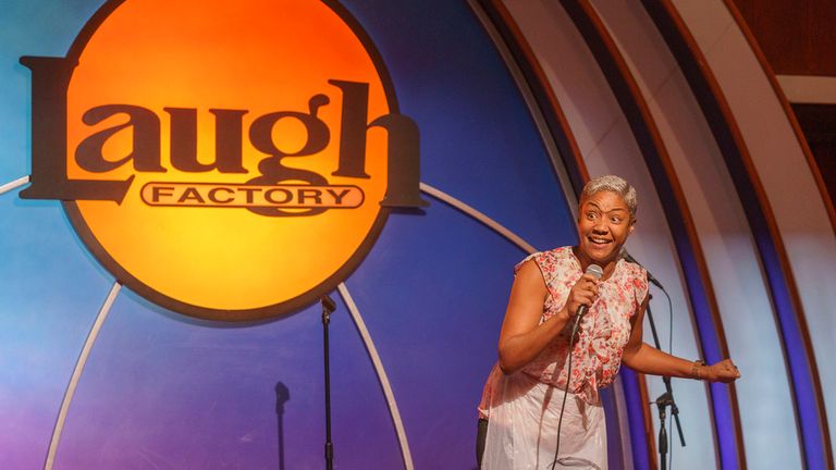 Stand-up comedian and actress Tiffany Haddish entertains guests at Laugh Factory Hollywood, during its free Thanksgiving meal Thursday, Nov. 23, 2023, in Los Angeles. (AP Photo/Damian Dovarganes)