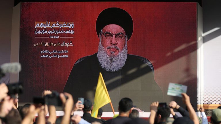 Lebanon&#39;s Hezbollah leader Sayyed Hassan Nasrallah appears on a screen as he addresses his supporters during a ceremony to honour fighters killed in the recent escalation with Israel, in Beirut&#39;s southern suburbs, Lebanon November 3, 2023. REUTERS/Mohamed Azakir
