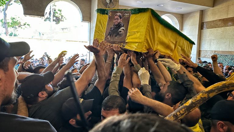 Thousands gathered for a funeral for a Hezbollah fighter