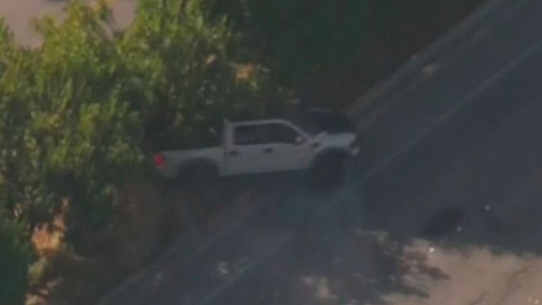Truck spins into a tree following a police chase across two counties in Los Angeles